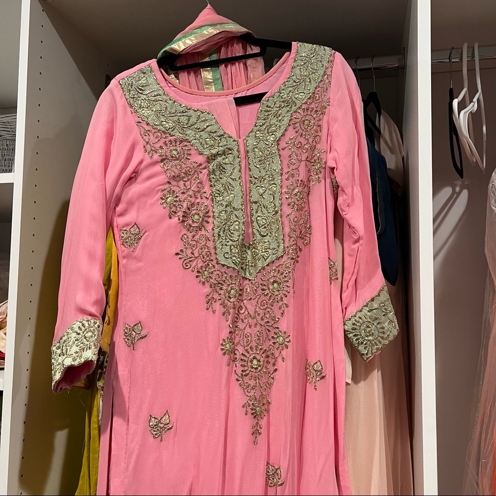 Pink and green suit.. never worn